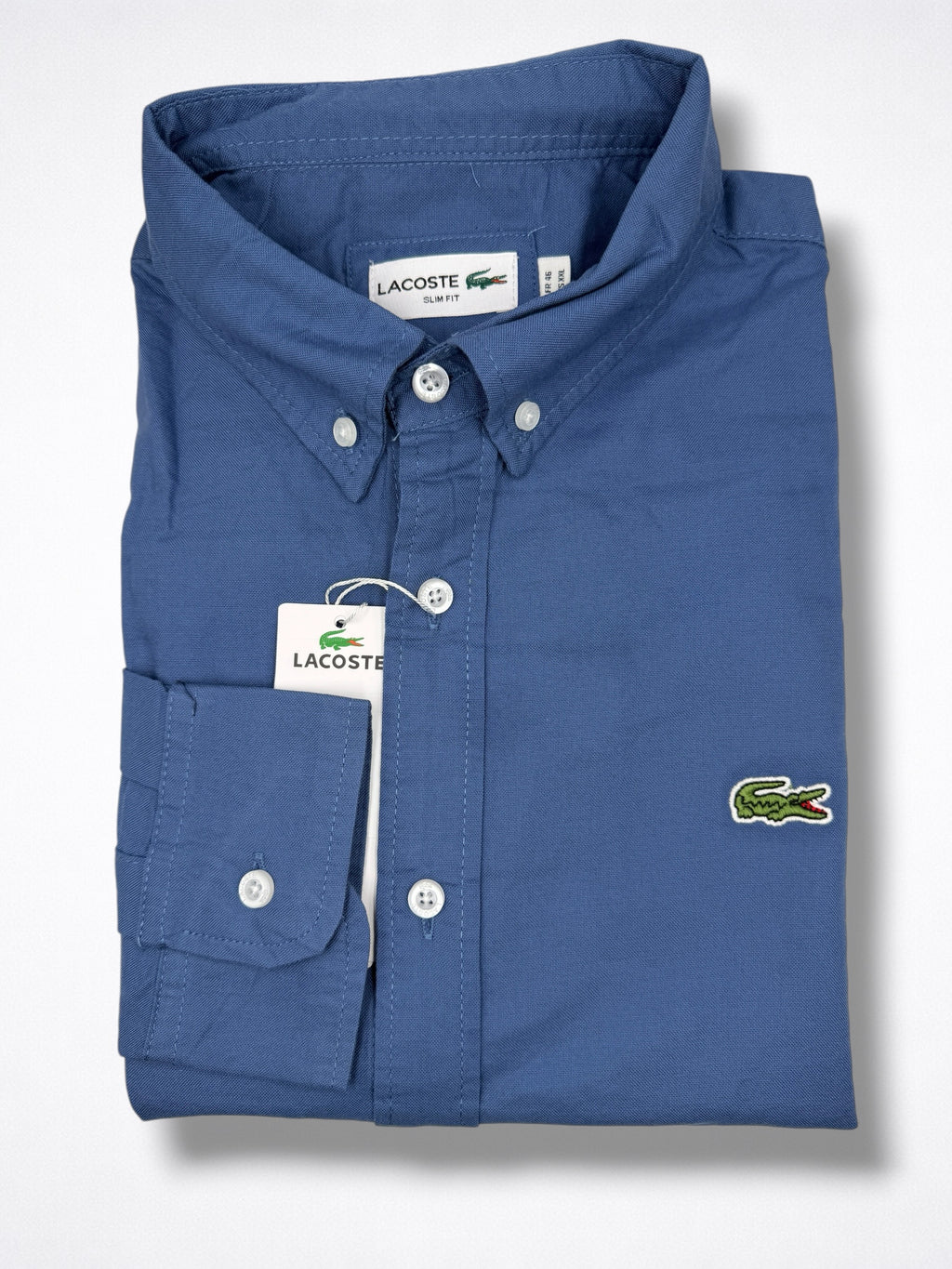 Camisa Lacoste talla L slim fit stretch, viene reducida, sirve para talla S